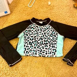 Never worn swimsuit cover up. It also cropped